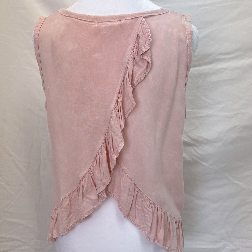 Anthropologie NYTT pink tank with ruffled cross back detail.